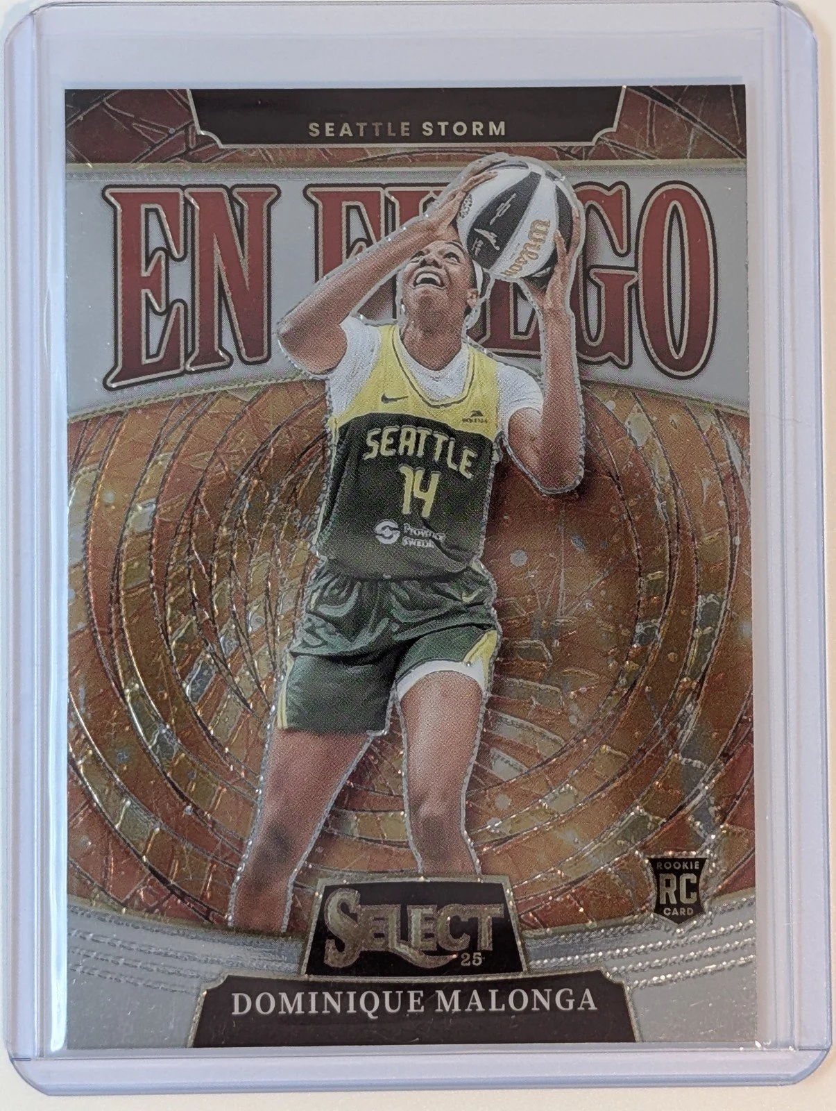 Front of 2025 Panini Select WNBA #1 Dominique Malonga En Fuego RC