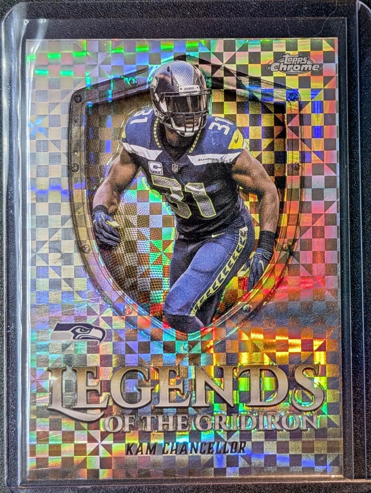 Front of 2025 Topps Chrome #LOG-34 Kam Chancellor Legends of the Gridiron X-Fractor
