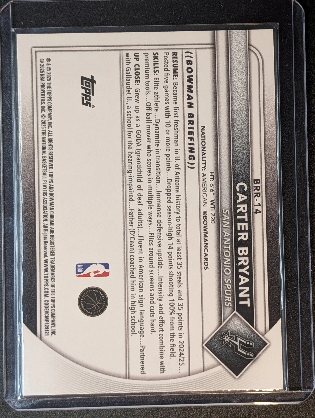 Back of 2025-26 Bowman #BRR-14 Carter Bryant Chrome Rookie Red RC Logo