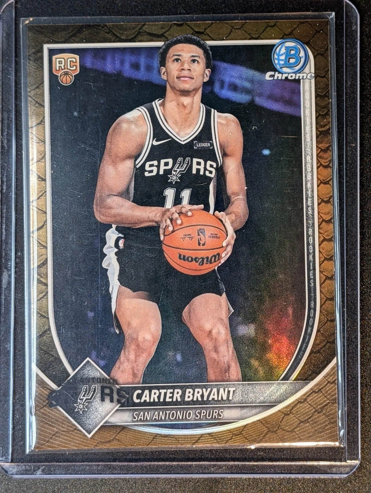 Front of 2025-26 Bowman #BCV-14 Carter Bryant Chrome Reptilian Refractors