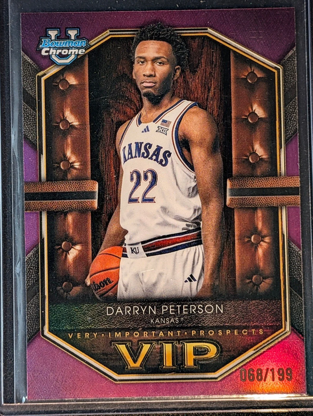 Front of 2025-26 Bowman #VIP-2 Darryn Peterson VIP Fuchsia Refractors #/199
