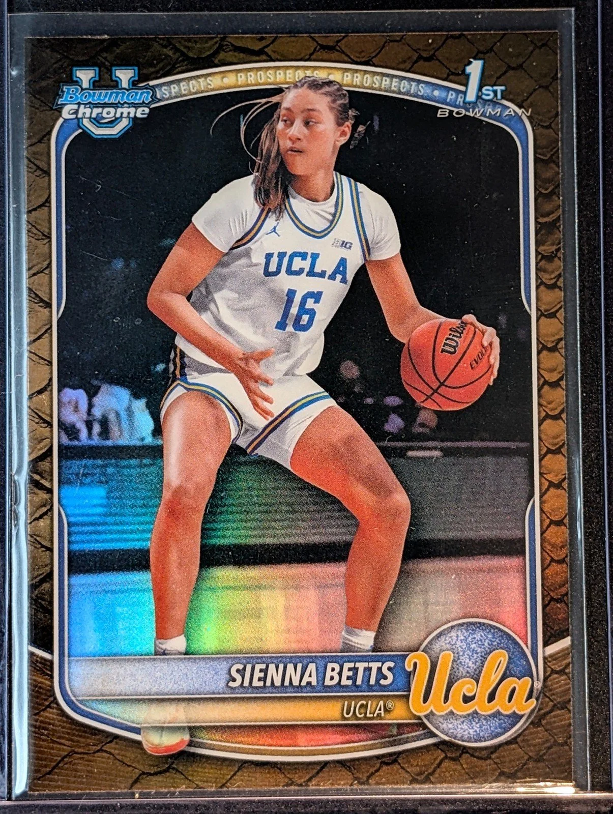 Front of 2025-26 Bowman #BCP-13 Sienna Betts Chrome Prospects Reptilian Refractor