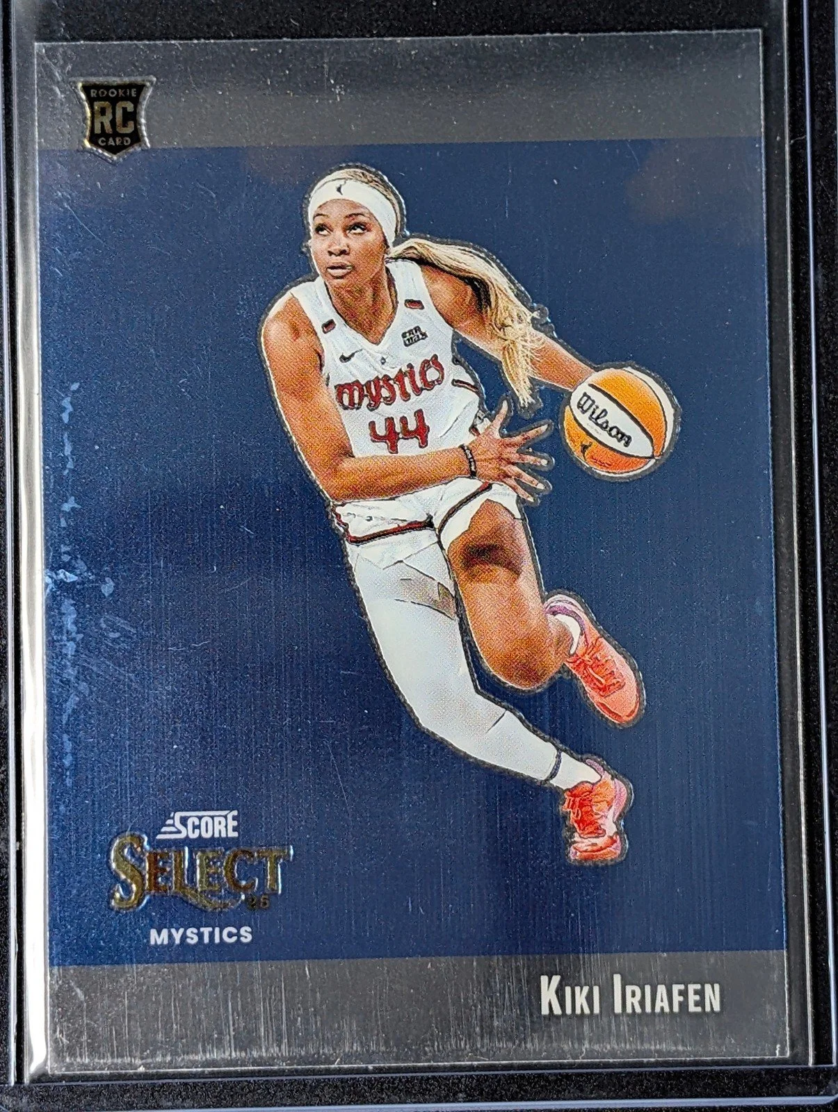 Front of 2025 Panini Select WNBA #3 Kiki Iriafen Score Select Throwback