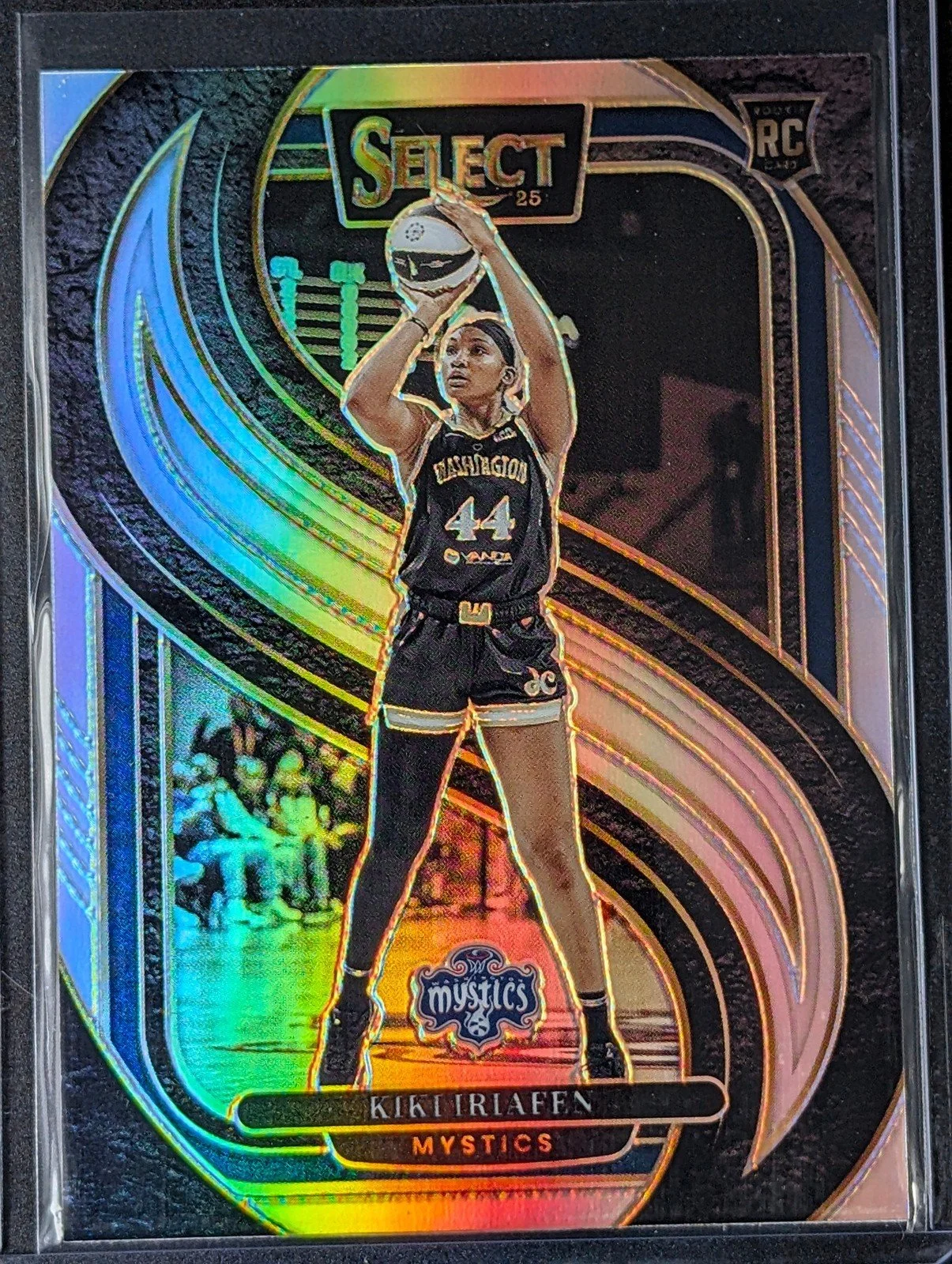 Front of 2025 Panini Select WNBA #102 Kiki Iriafen Silver Prizms