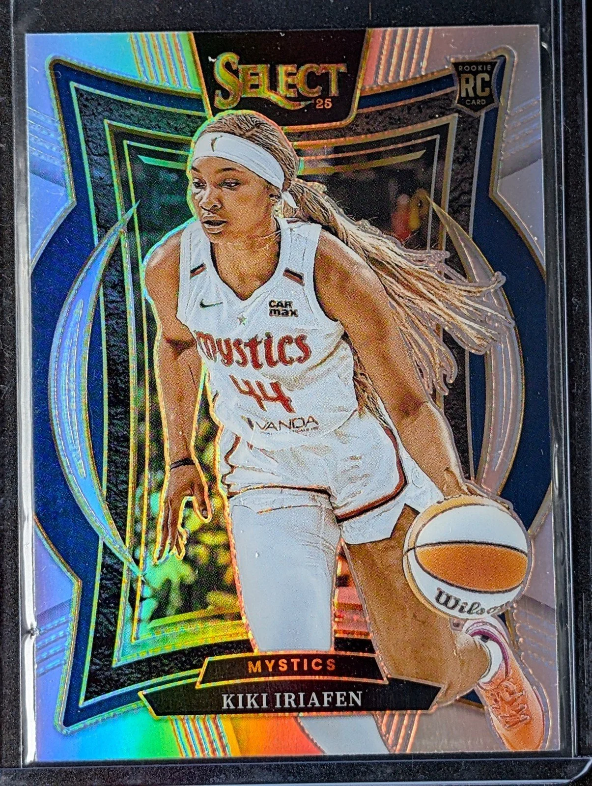 Front of 2025 Panini Select WNBA #91 Kiki Iriafen Silver Prizms