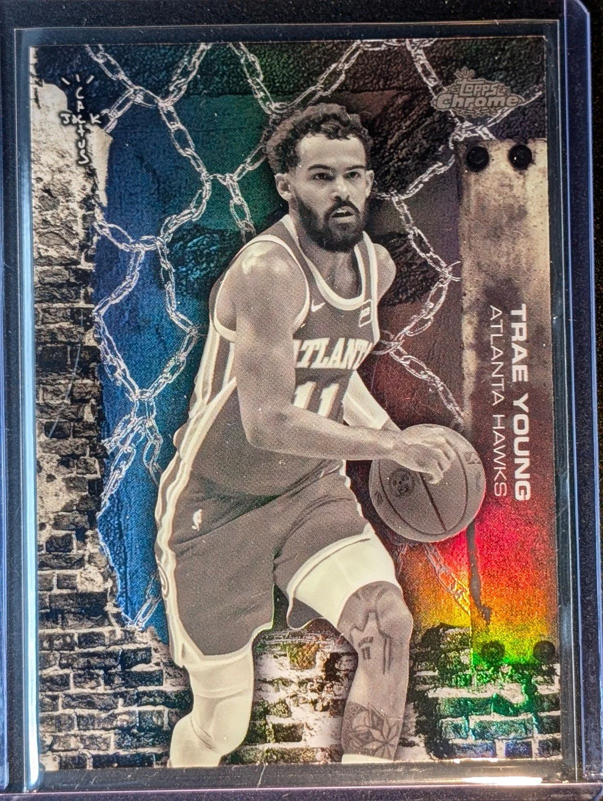 Front of 2025-26 Topps Chrome Cactus Jack #19 Trae Young White Refractor