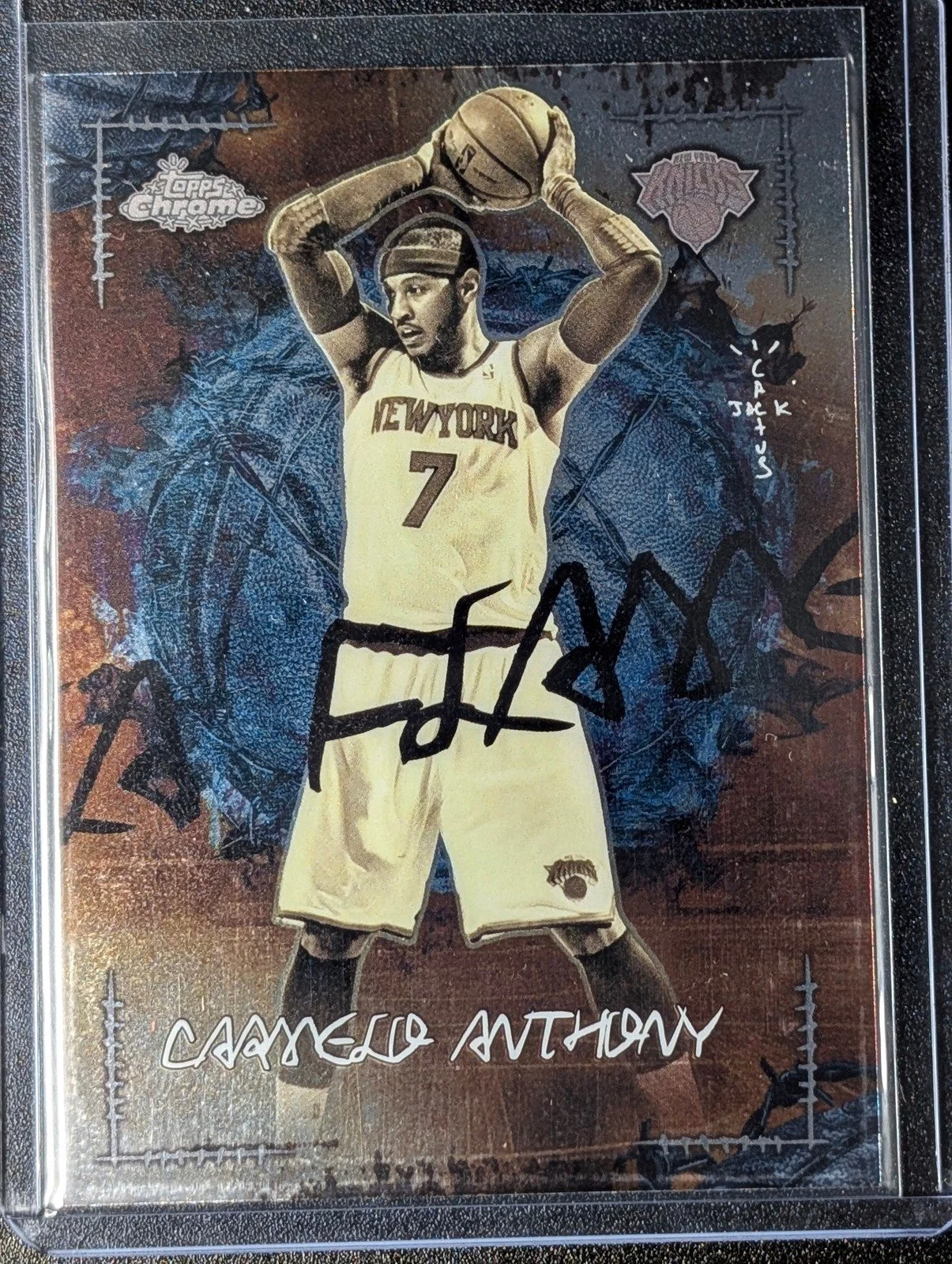 Front of 2025-26 Topps Chrome Cactus Jack #LFL-12 Carmelo Anthony La Flame Legends