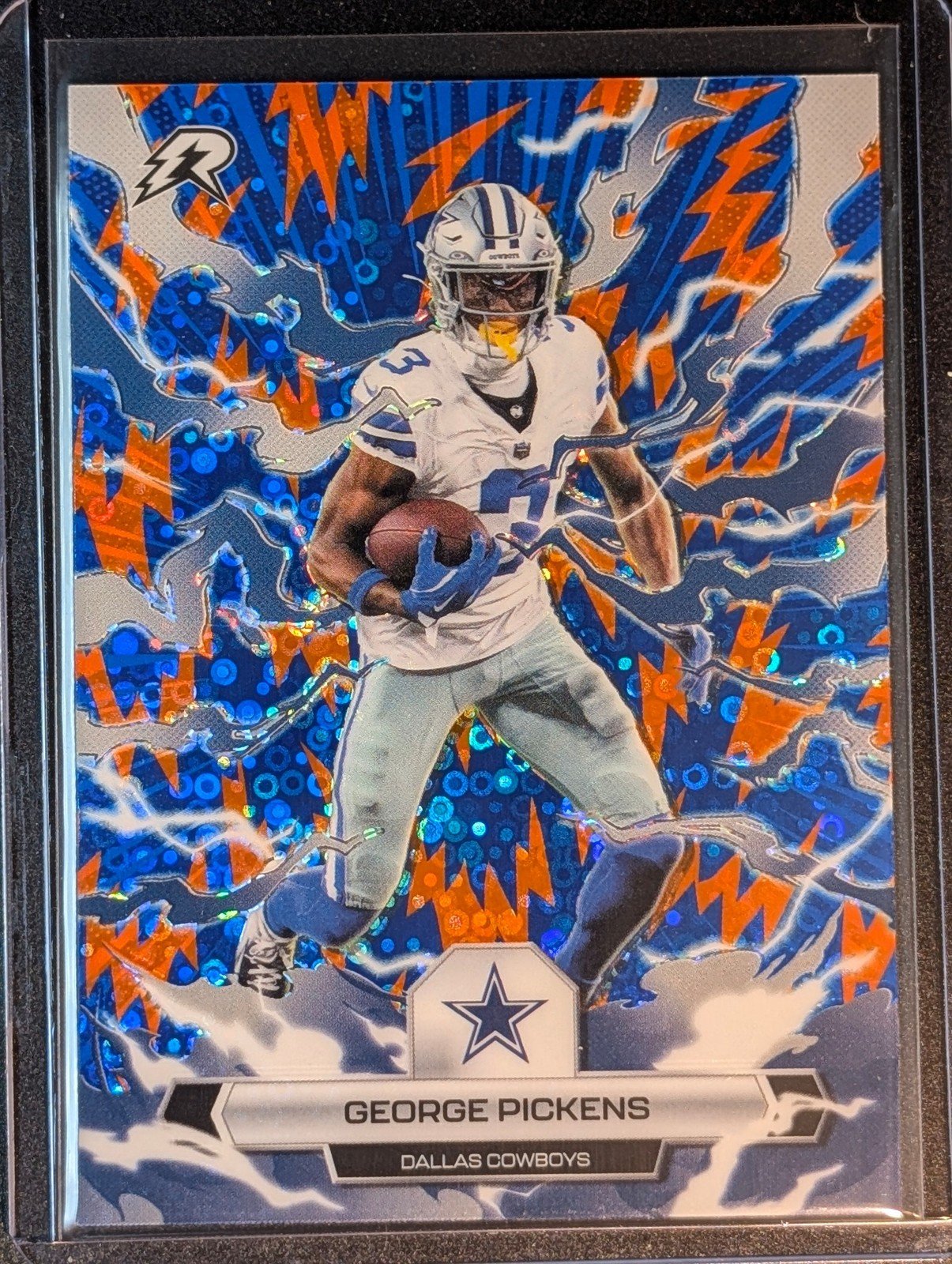 Front of 2025 Topps Resurgence #27 George Pickens Blue & Orange Spark Refractor
