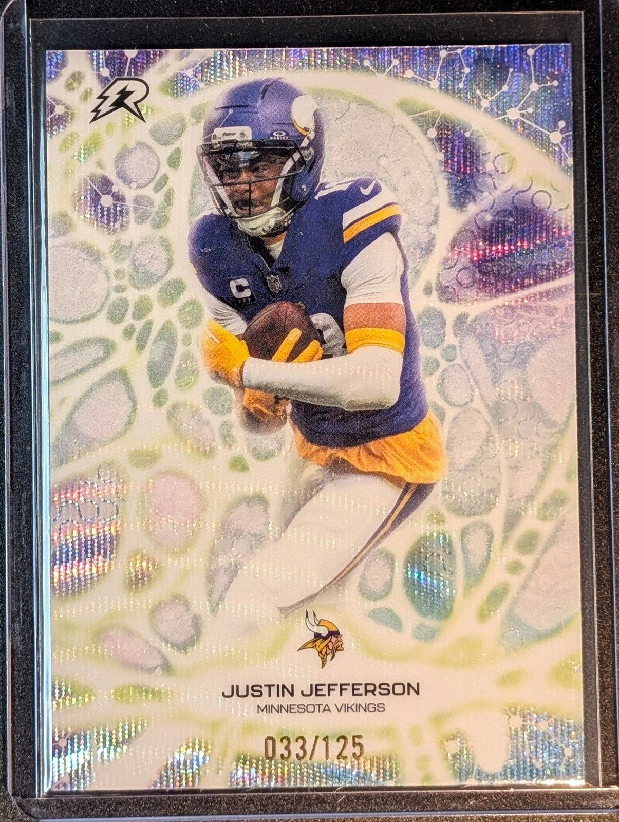 Front of 2025 Topps Resurgence /125 #PT-24 Justin Jefferson Protonyx