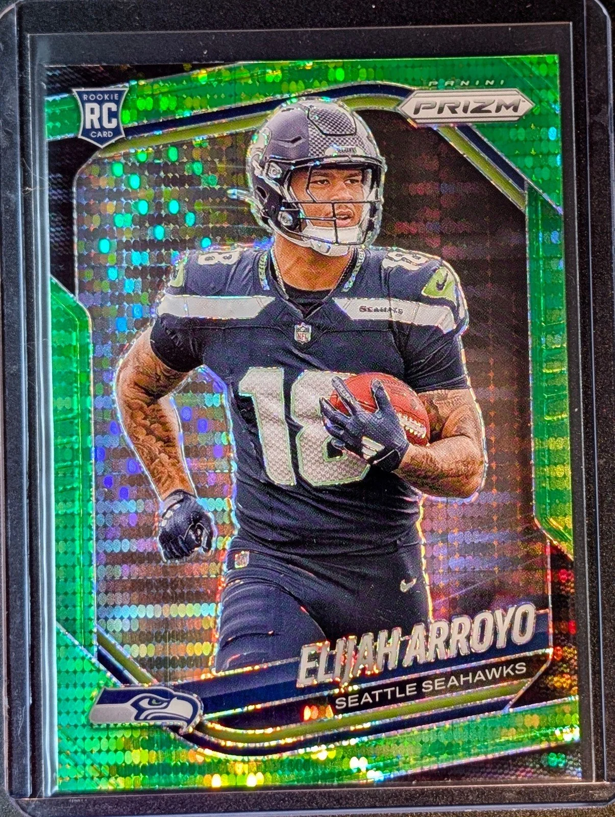 Front of 2025 Panini Prizm #309 Elijah Arroyo Green Pulsar Rookie