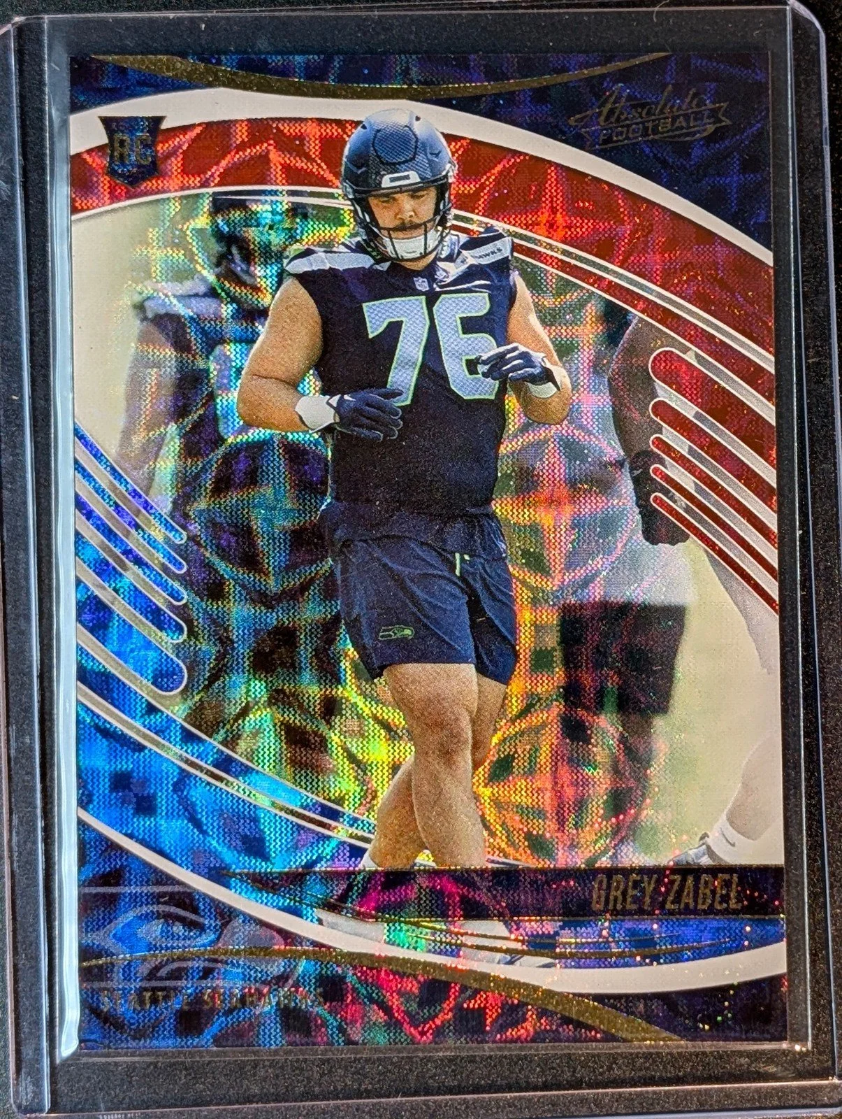 Front of 2025 Panini Absolute #125 Grey Zabel Red, White and Blue Kaleidoscope Rookie