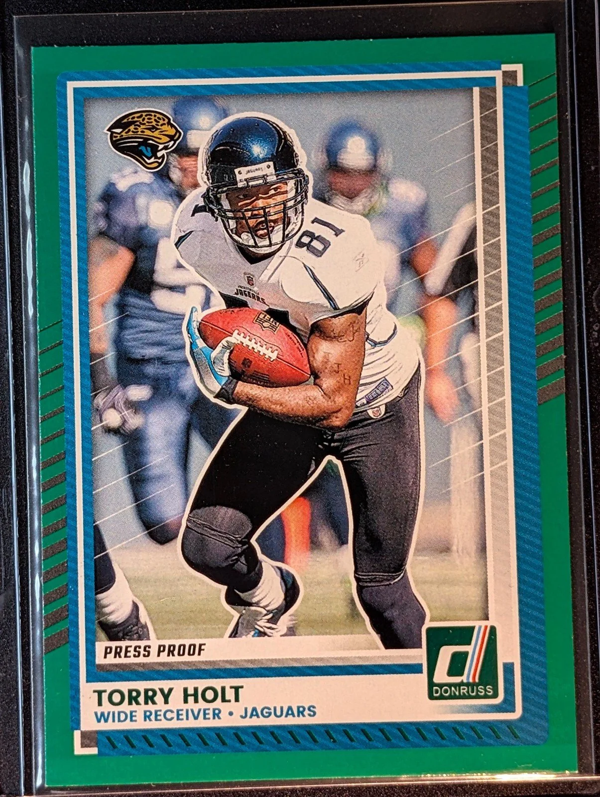 Front of 2025 Donruss #119 Torry Holt Press Proofs Green