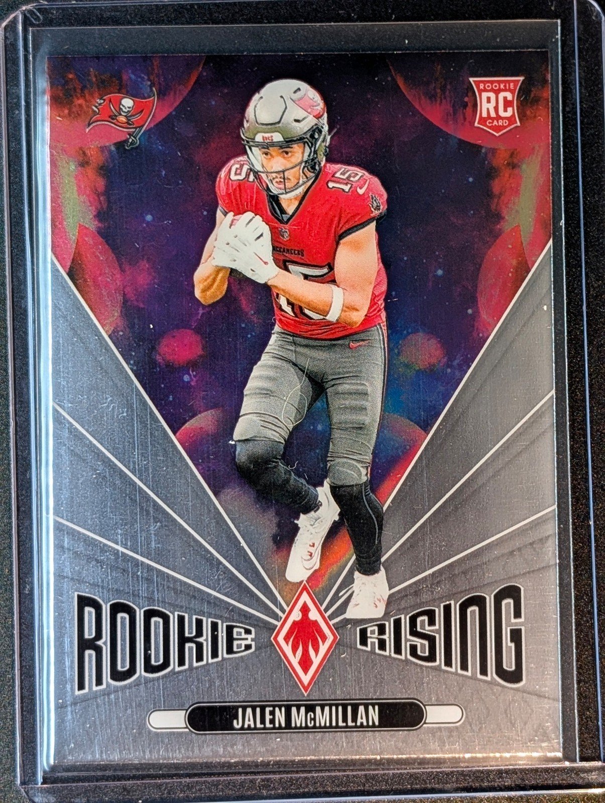 Front of 2024 Panini Phoenix #RR-JMN Jalen McMillan Rookie Rising Orange