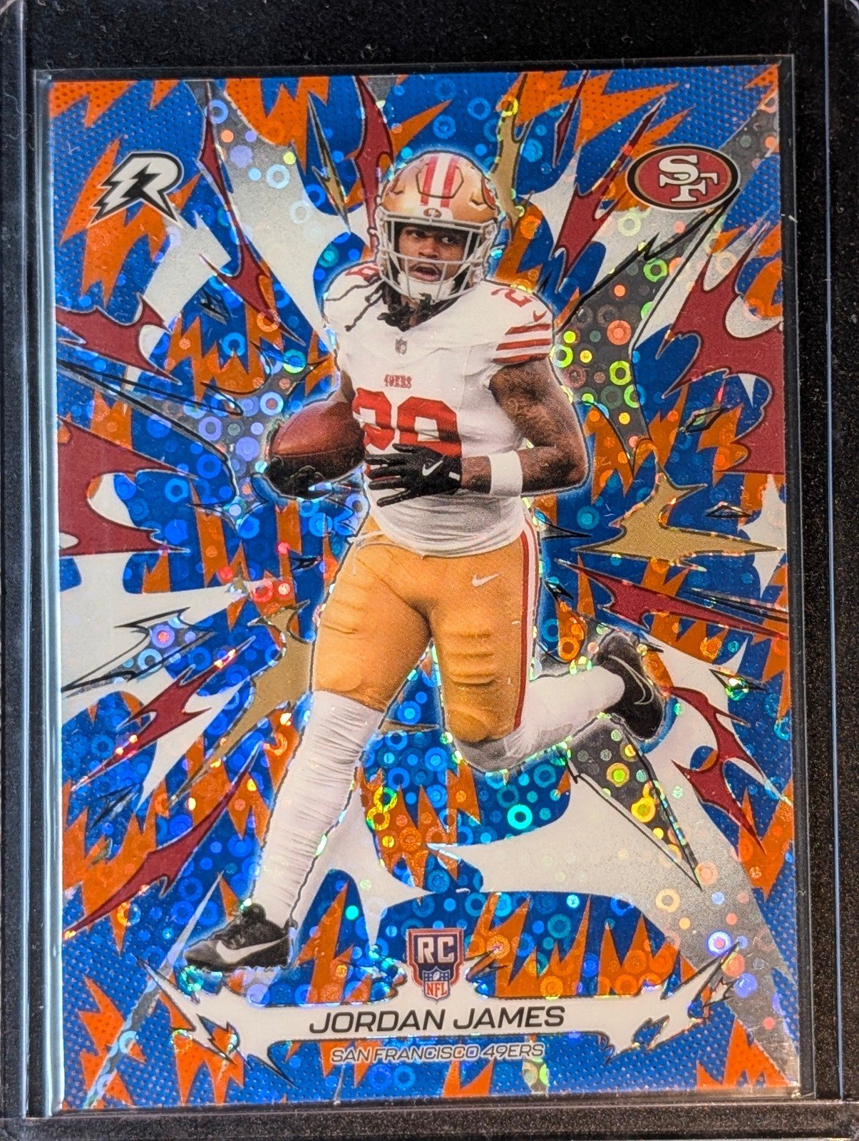 Front of 2025 Topps Resurgence #185 Jordan James Blue & Orange Spark Refractor