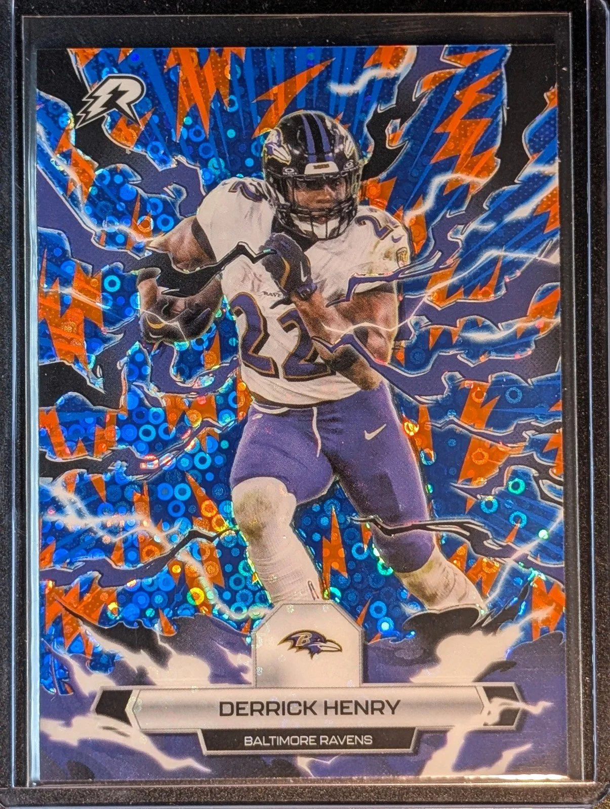 Front of 2025 Topps Resurgence #8 Derrick Henry Blue & Orange Spark Refractor