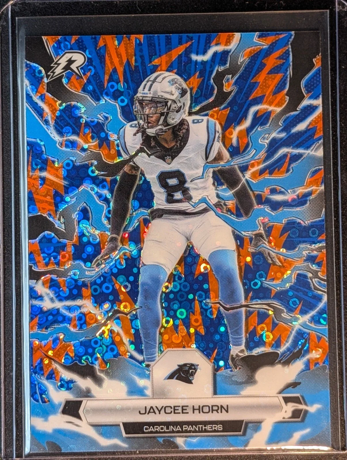 Front of 2025 Topps Resurgence #15 Jaycee Horn Blue & Orange Spark Refractor