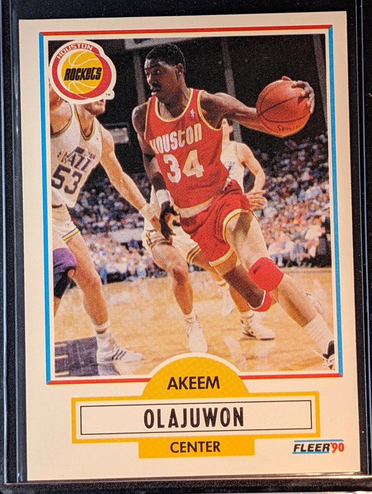 Front of 1990-91 Fleer #73 Akeem Olajuwon