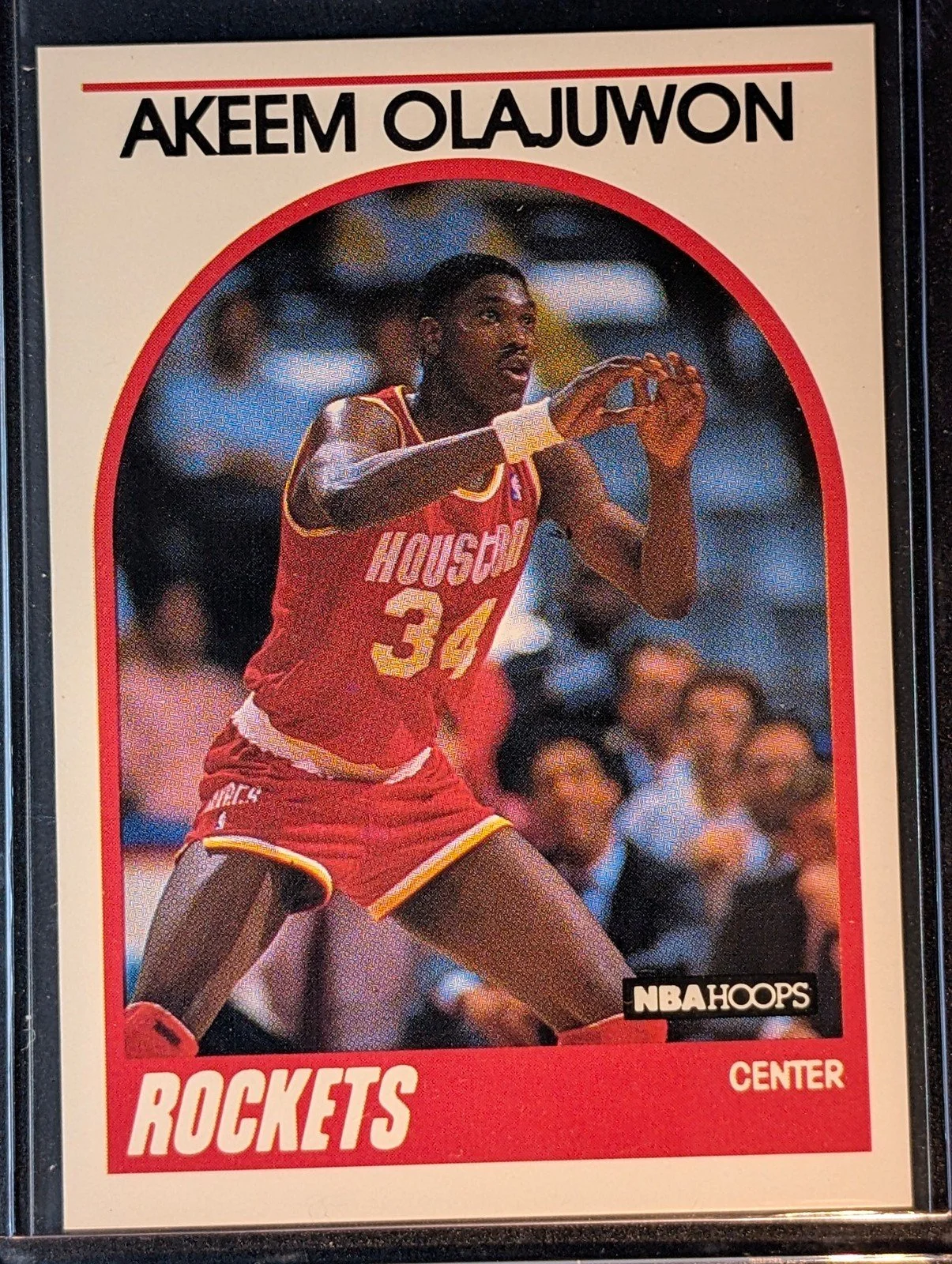 Front of 1989-90 Hoops #180 Akeem Olajuwon