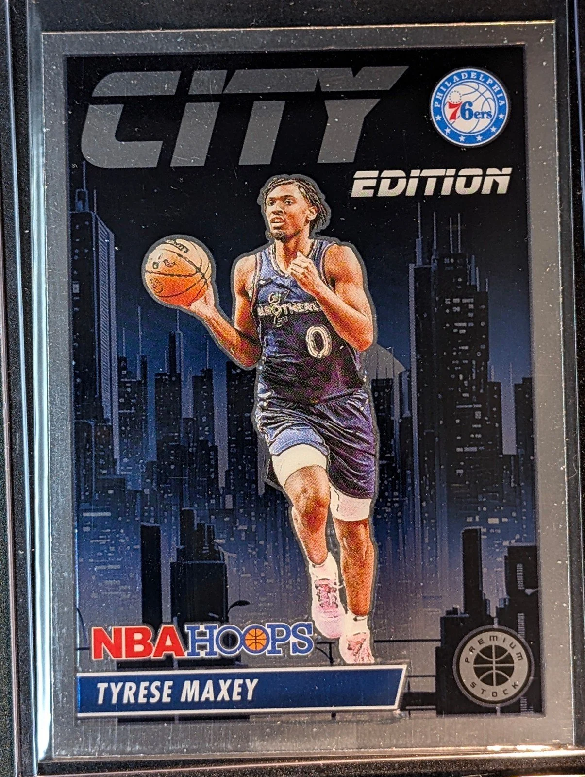 Front of 2023-24 Hoops Premium Stock #18 Tyrese Maxey City Edition