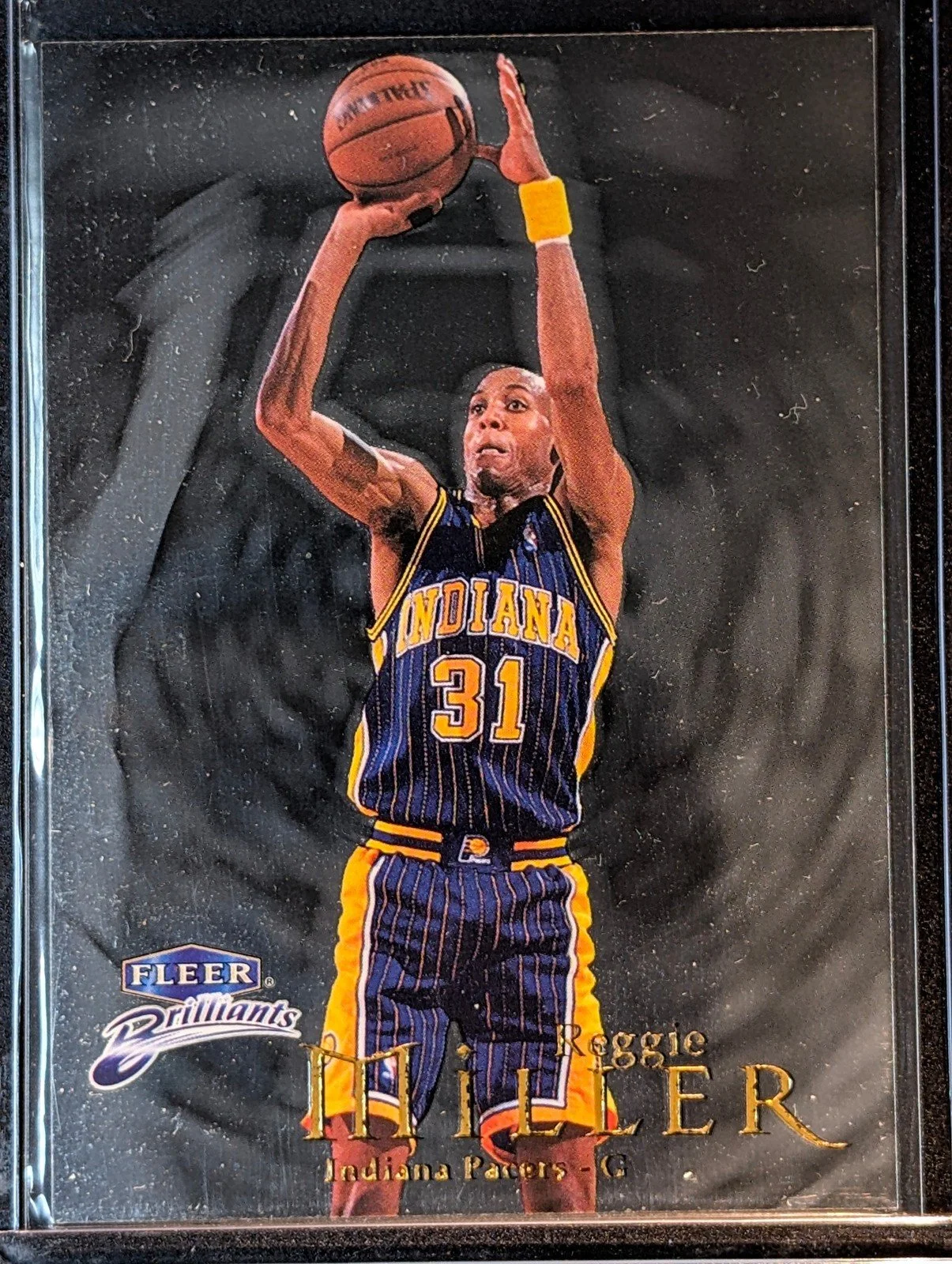 Front of 1998-99 Fleer Brilliants #22 Reggie Miller