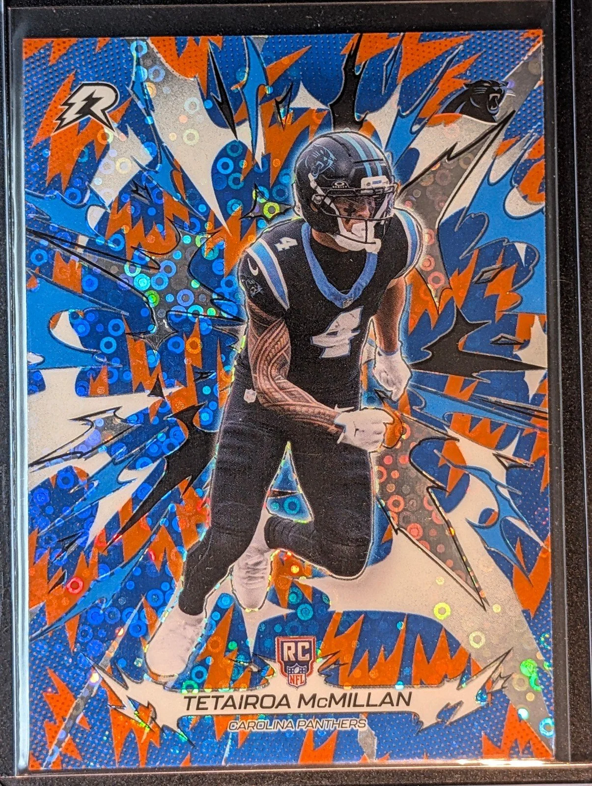 Front of 2025 Topps Resurgence #111 Tetairoa McMillan Blue & Orange Spark Refractor RC