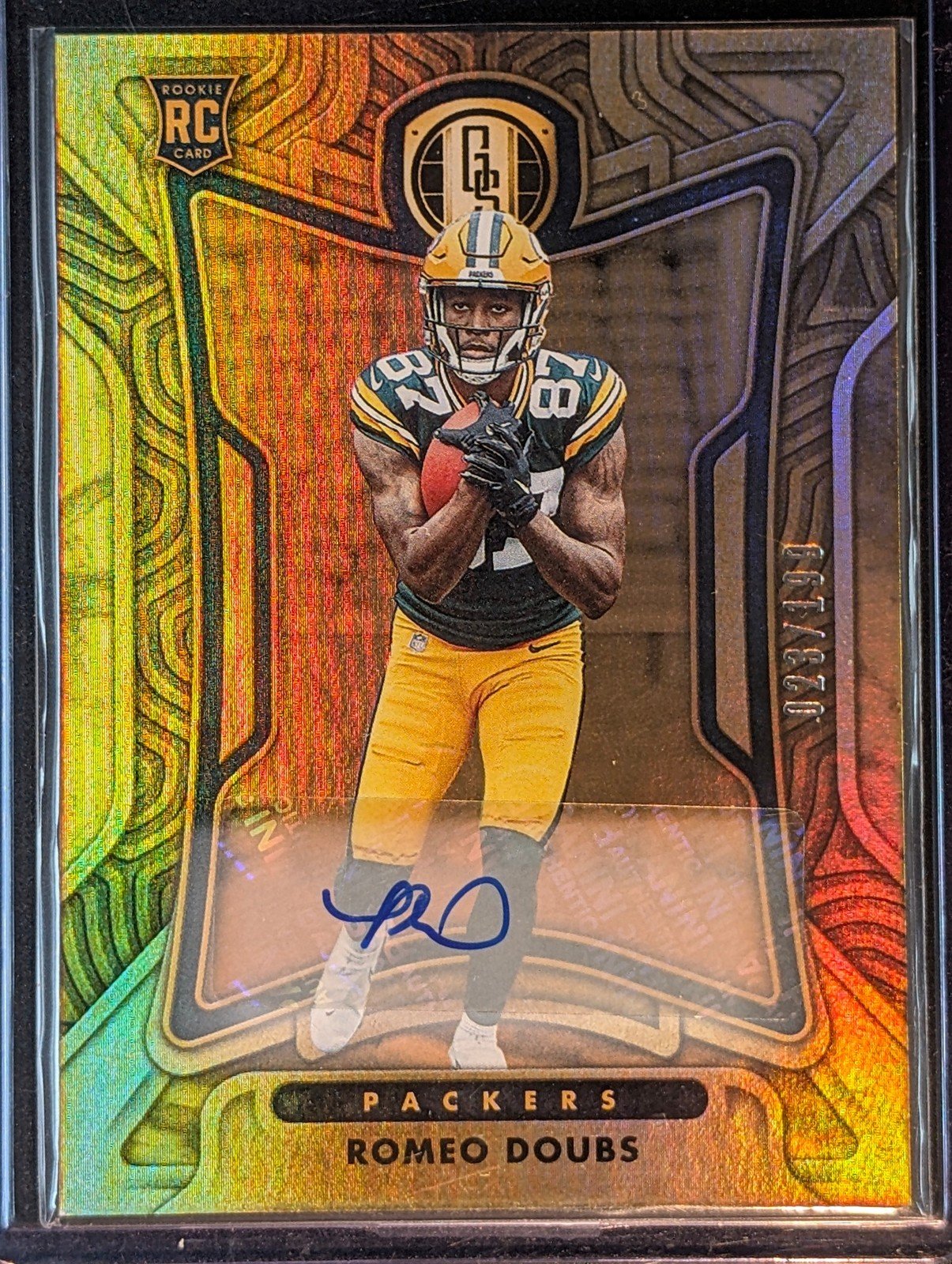 Front of 2022 Panini Gold Standard /199 #134 Romeo Doubs Rookies Autographs