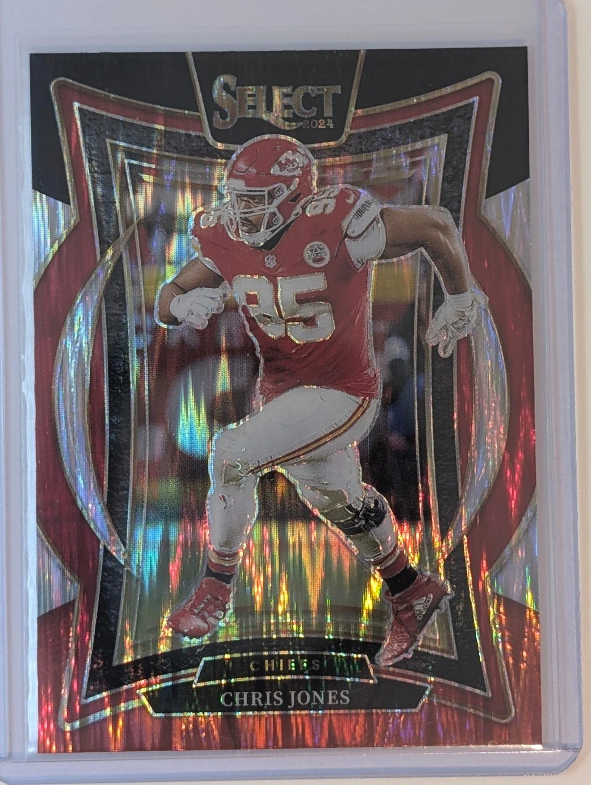 Front of 2024 Panini Select #19 Chris Jones Black & Gold Prizm Shock