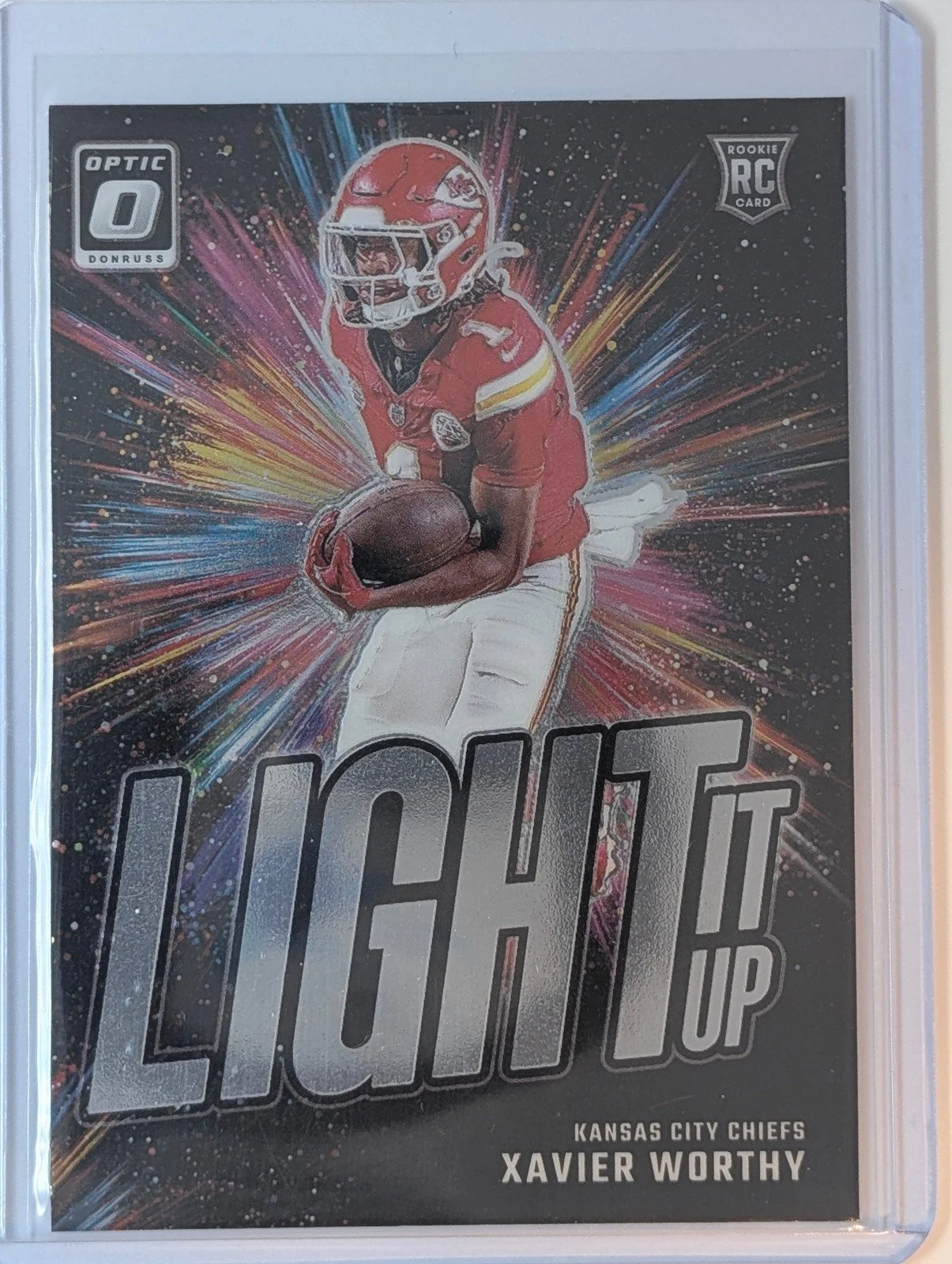 Front of 2024 Donruss Optic #9 Xavier Worthy Light It Up