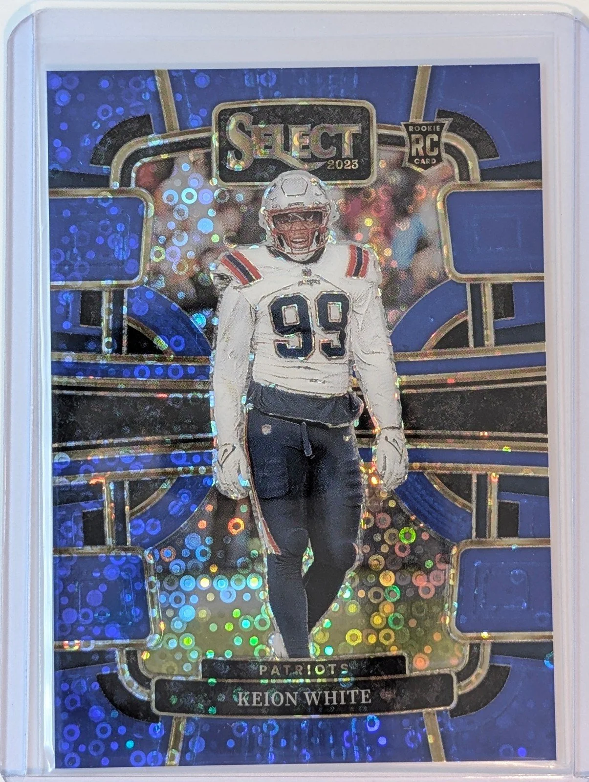Front of 2023 Panini Select /25 #69 Keion White Blue Disco Prizm Rookie