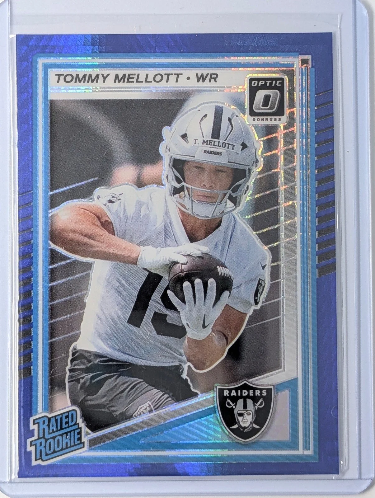 Front of 2025 Donruss Optic #299 Tommy Mellott Blue Hyper RC