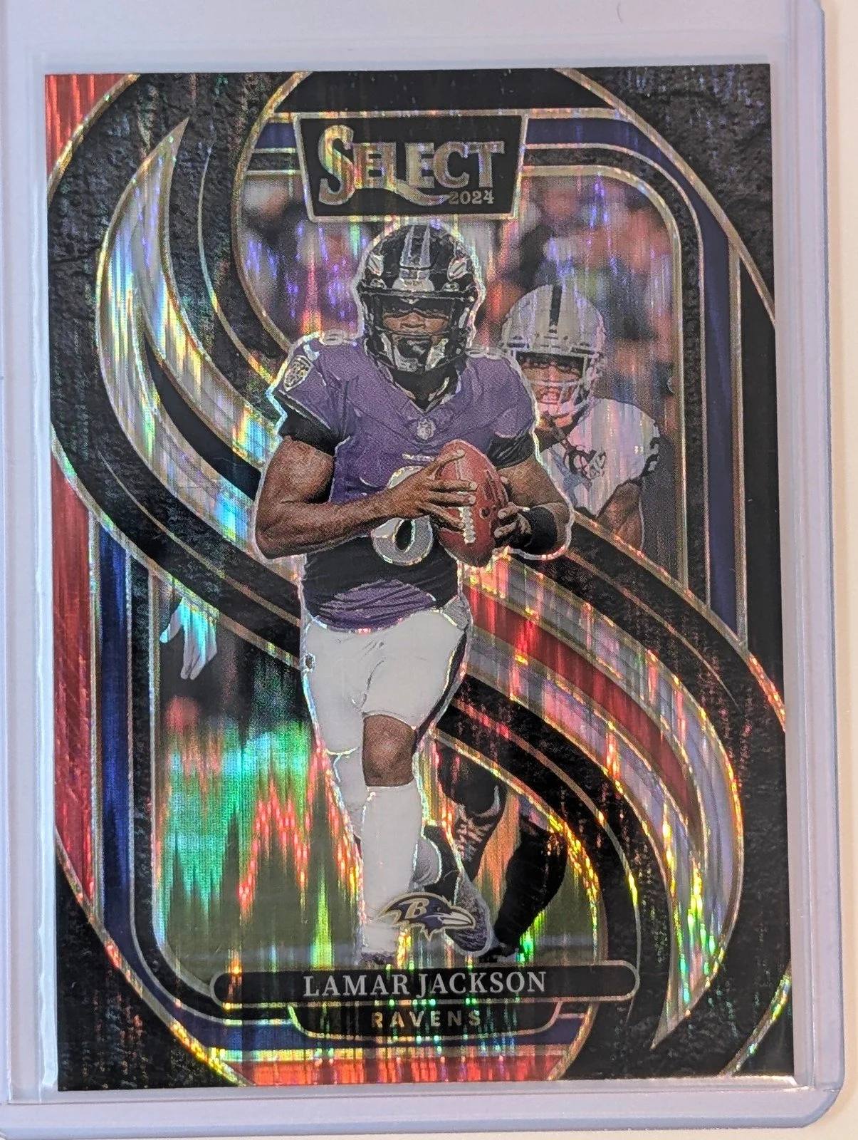 Front of 2024 Panini Select #121 Lamar Jackson Black & Red Prizm Shock