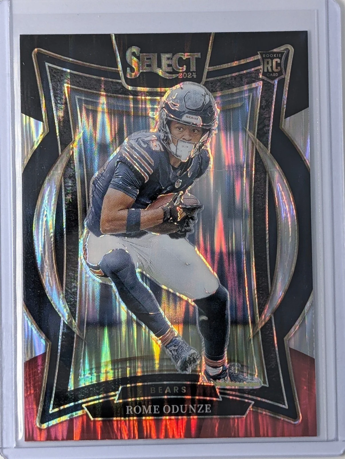 Front of 2024 Panini Select #3 Rome Odunze Black & Red Prizm Shock Rookie