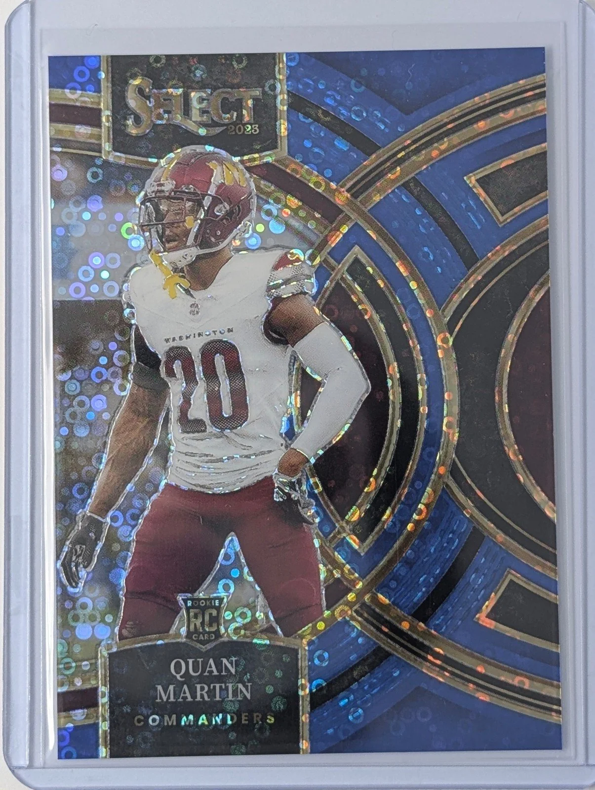 Front of 2023 Panini Select 1/25 #137 Quan Martin Blue Disco Prizm 25 Rookie