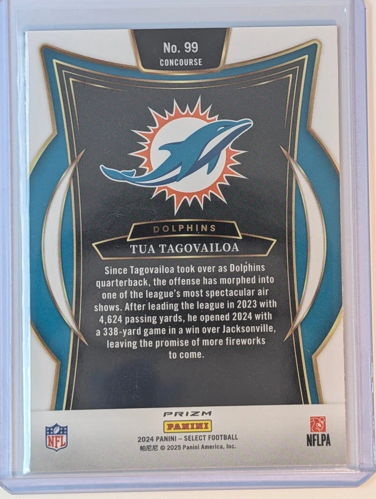 Back of 2024 Panini Select #99 Tua Tagovailoa Black & Red Prizm Shock