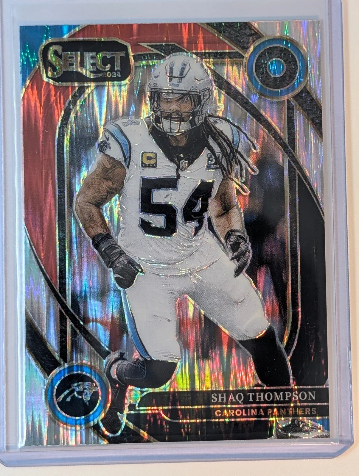 Front of 2024 Panini Select #293 Shaq Thompson Red & Blue Prizm Shock