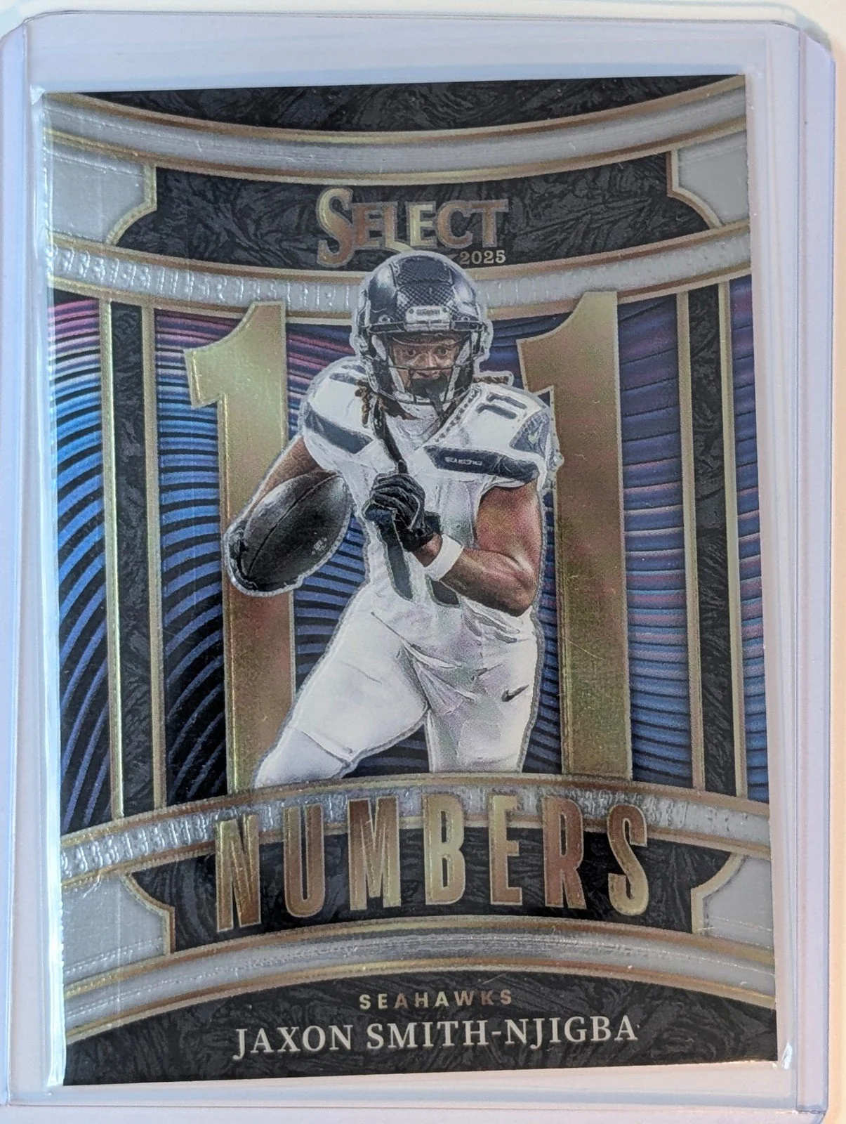 Front of 2025 Panini Select #20 Jaxon Smith-Njigba Select Numbers