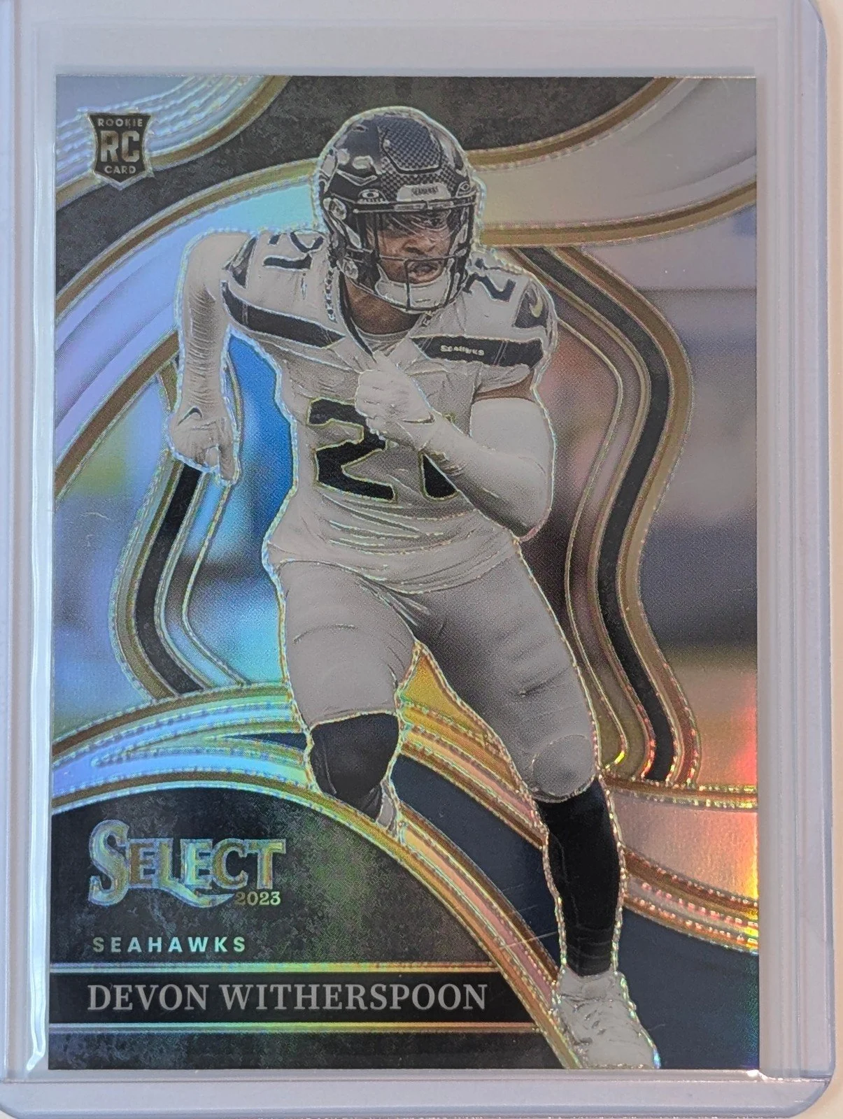 Front of 2023 Panini Select #273 Devon Witherspoon Silver Prizms