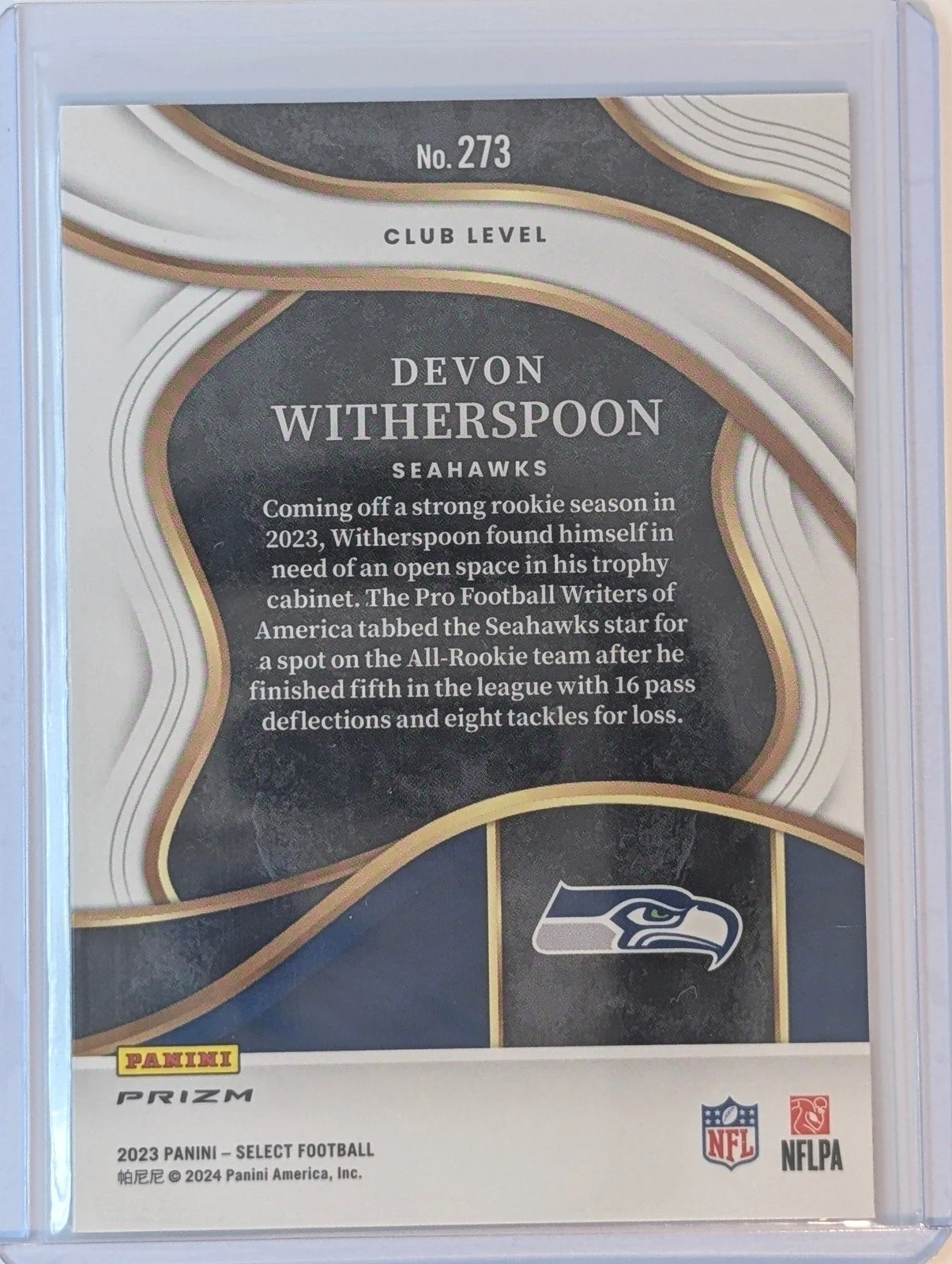 Back of 2023 Panini Select #273 Devon Witherspoon Silver Prizms