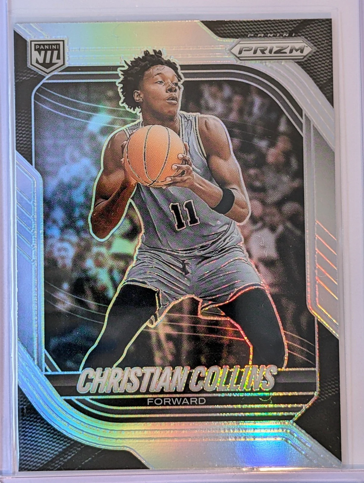 Front of 2025-26 Panini Prizm #95 Christian Collins