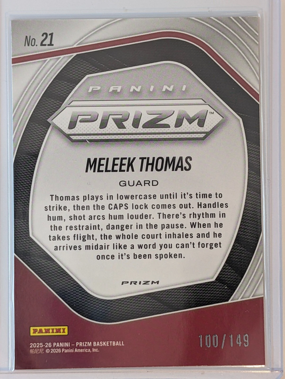 Back of 2025-26 Panini Prizm /149 #21 Meleek Thomas Kaleidescope Orange