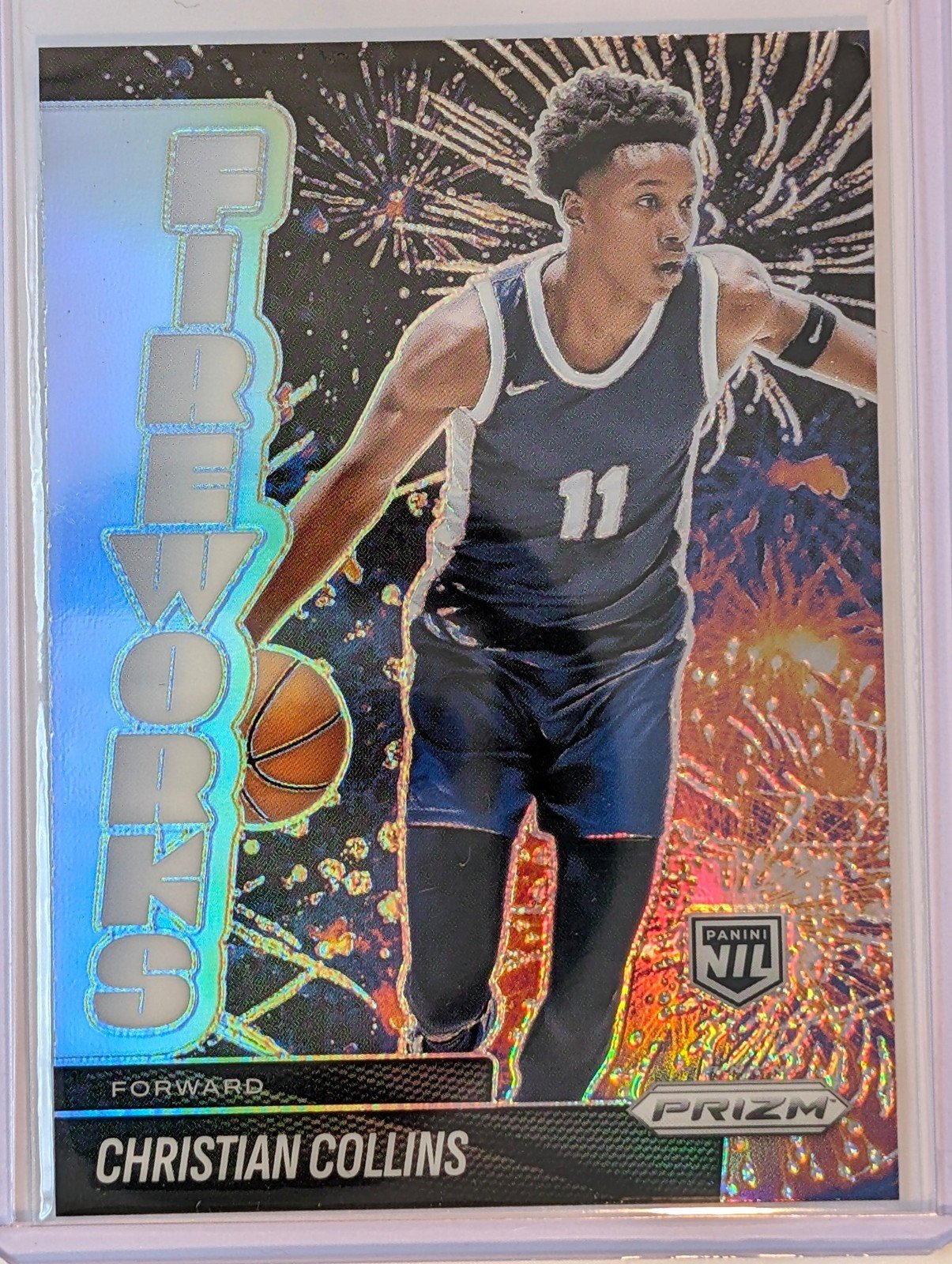 Front of 2025-26 Panini Prizm #13 Christian Collins Fireworks Refractor