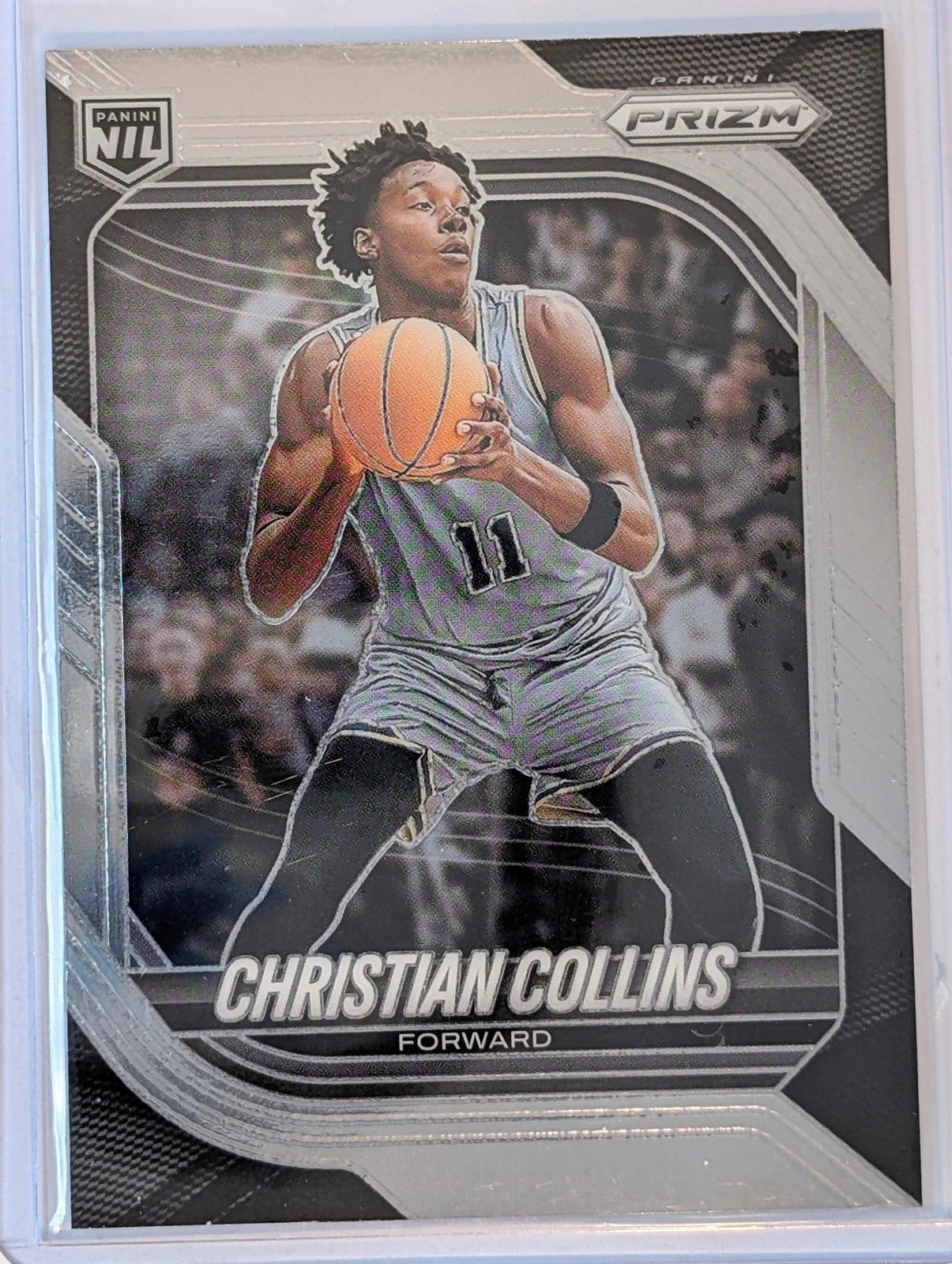 Front of 2025-26 Panini Prizm #95 Christian Collins