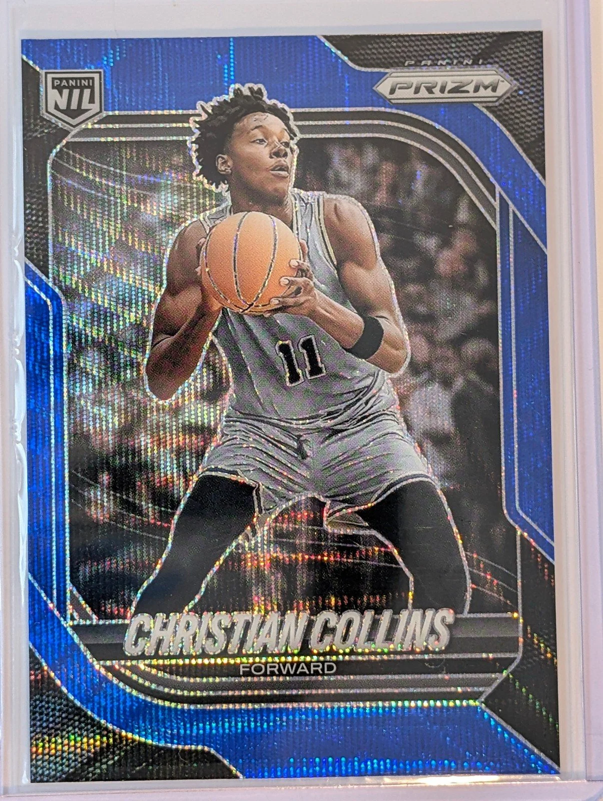Front of 2025-26 Panini Prizm /249 Christian Collins Blue Wave Prizm