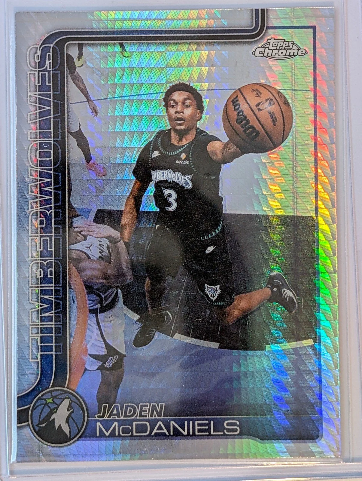 Front of 2025-26 Topps Chrome Update #126 Jaden McDaniels Prism Refractor