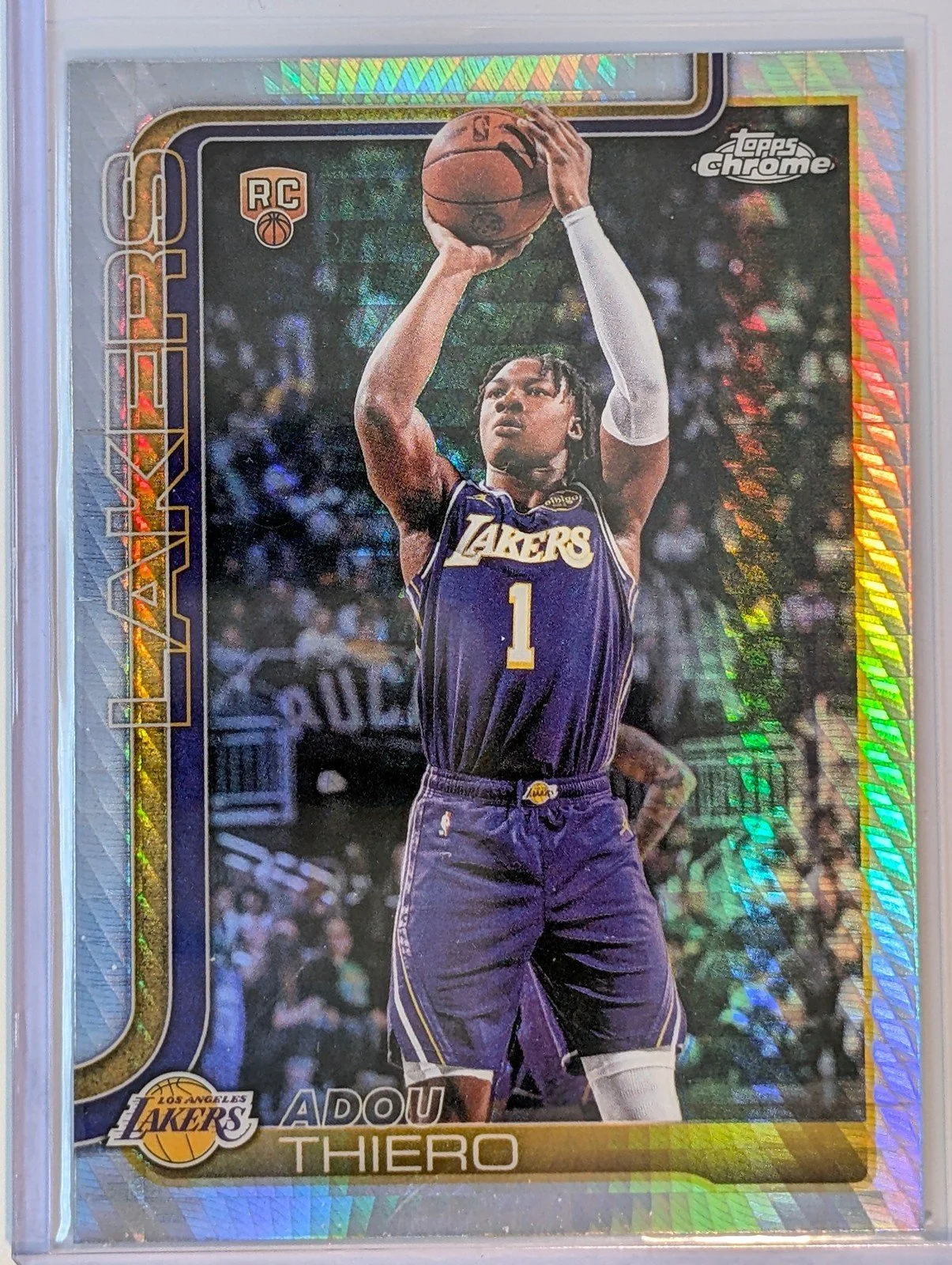 Front of 2025-26 Topps Chrome Update #186 Adou Thiero Refractor