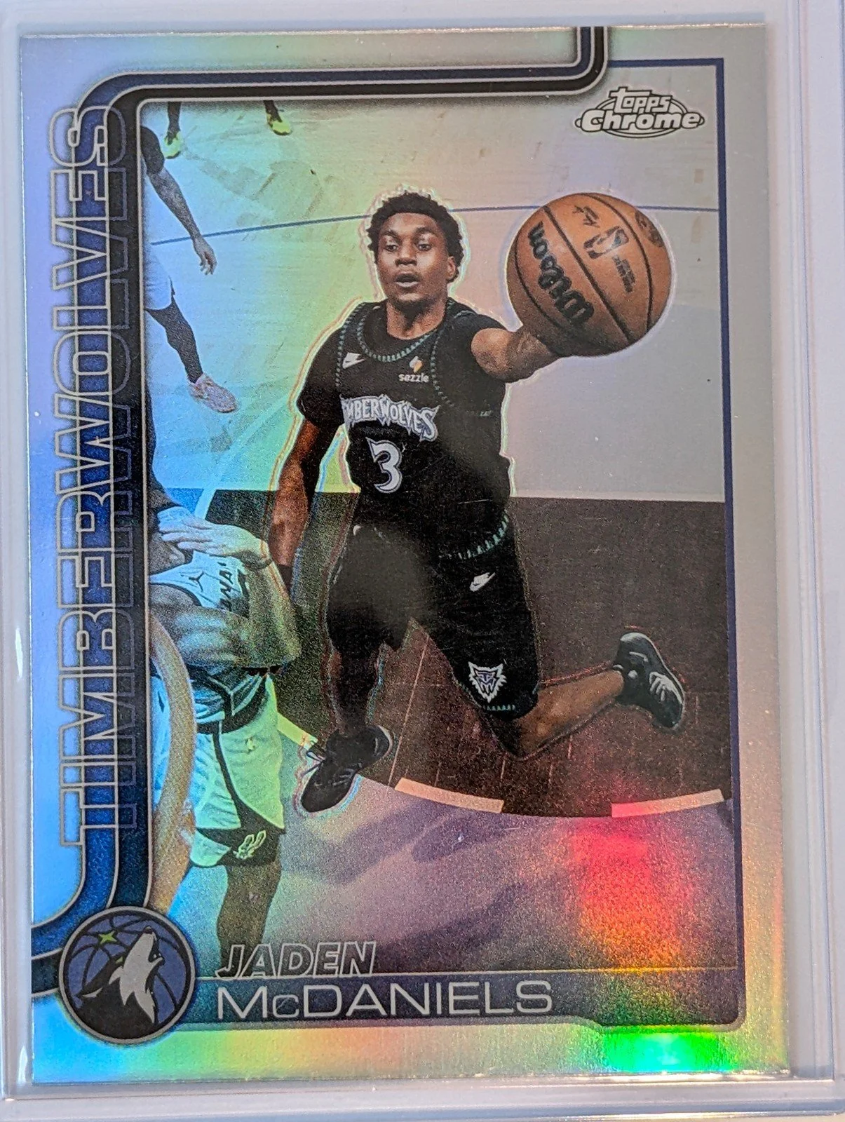Front of 2025-26 Topps Chrome Update #126 Jaden McDaniels Refractor