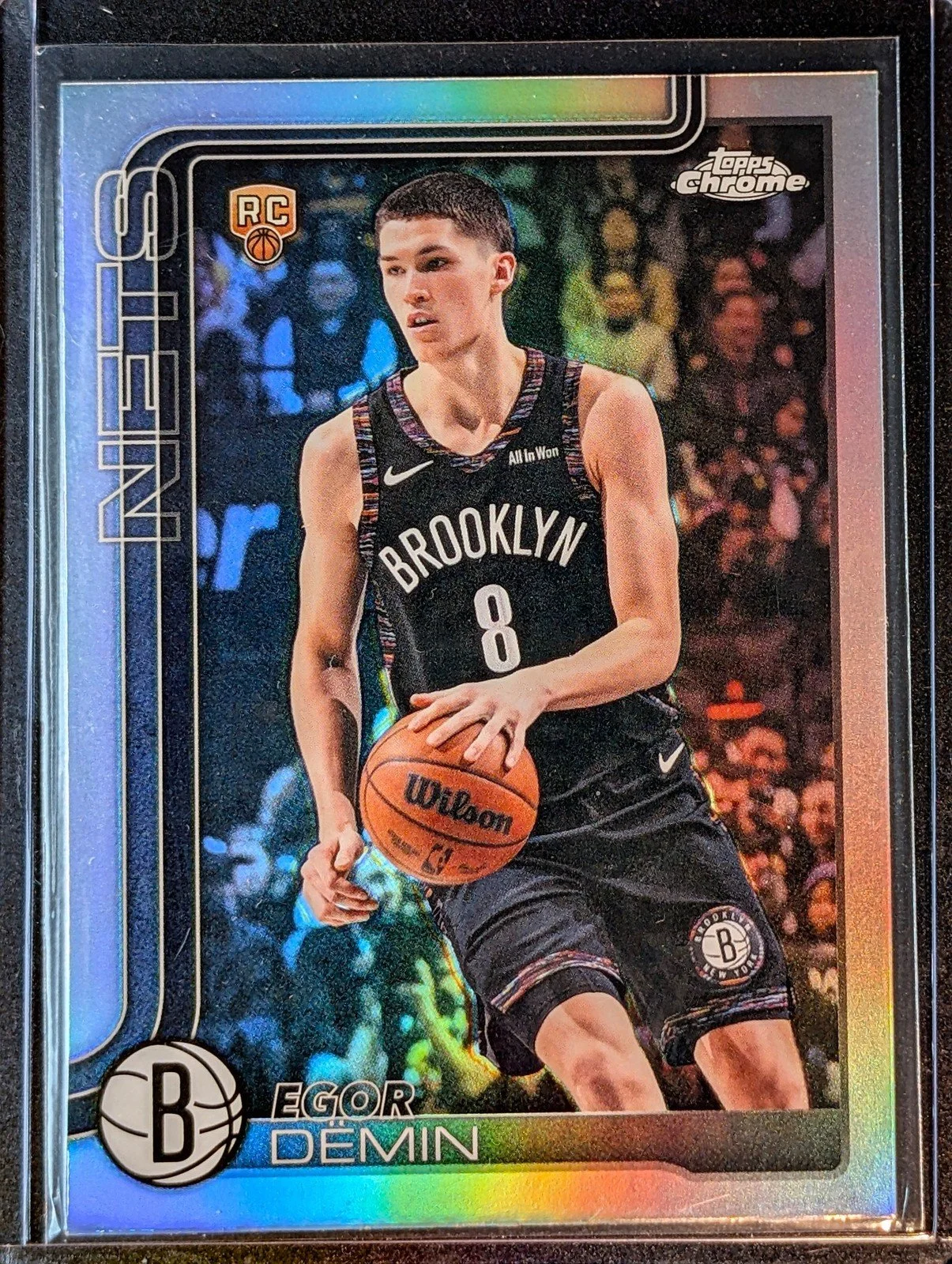 Front of 2025-26 Topps Chrome Update #158 Egor Dëmin Refractor