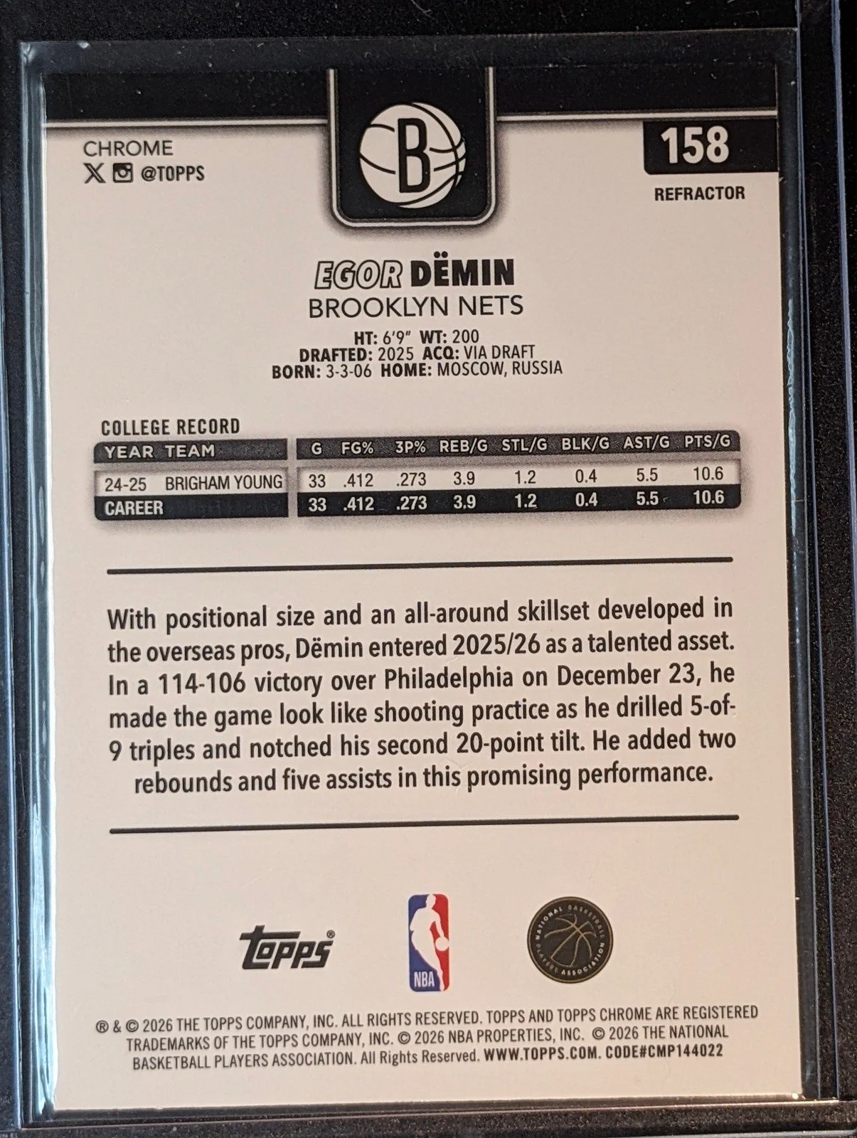 Back of 2025-26 Topps Chrome Update #158 Egor Dëmin Refractor