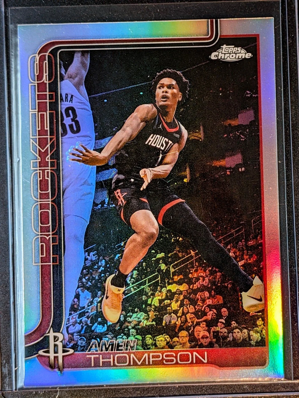 Front of 2025-26 Topps Chrome Update #44 Amen Thompson Refractor
