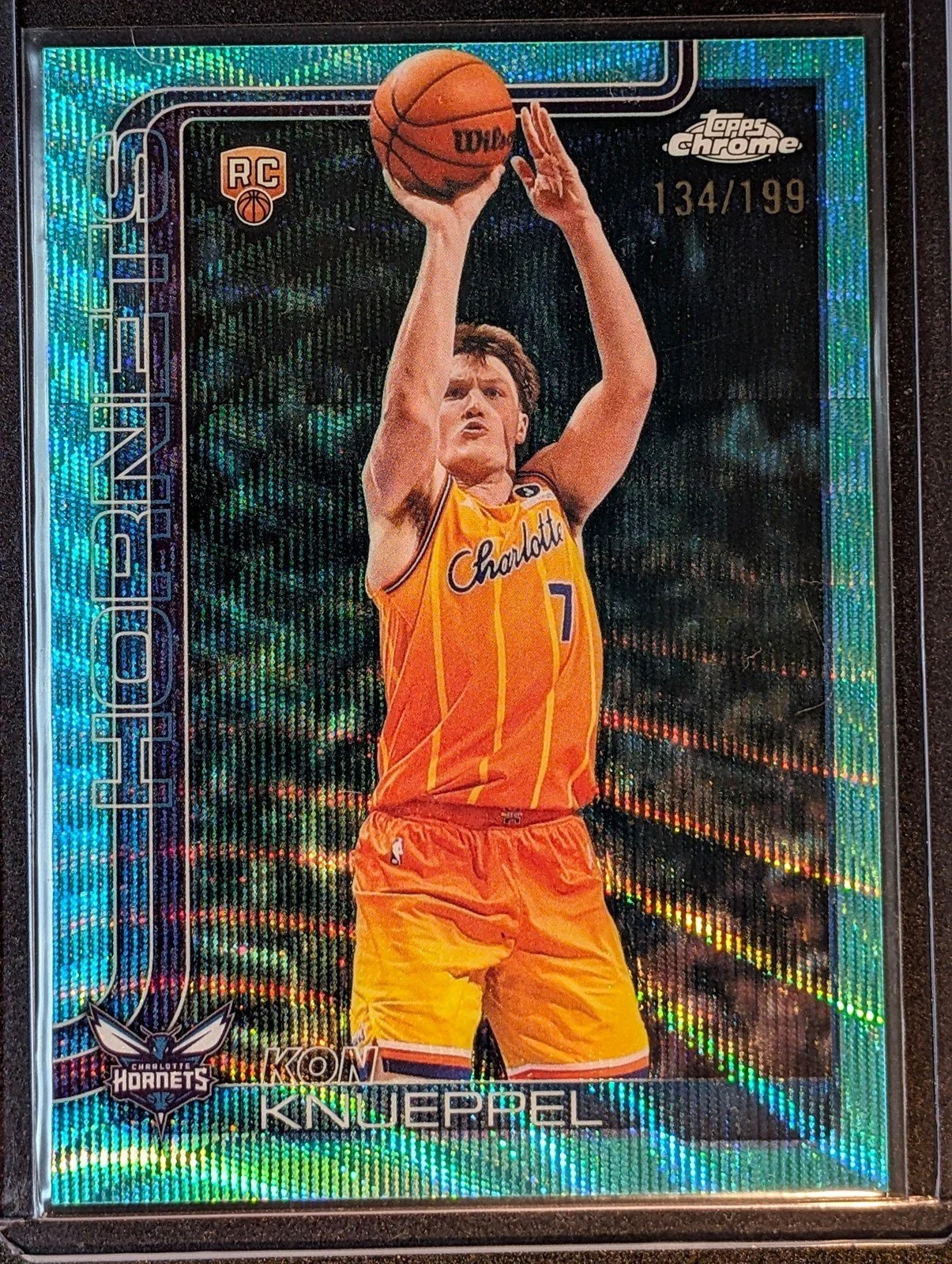 Front of 2025-26 Topps Chrome Update /199 Kon Knueppel Aqua Wave Refractor #154